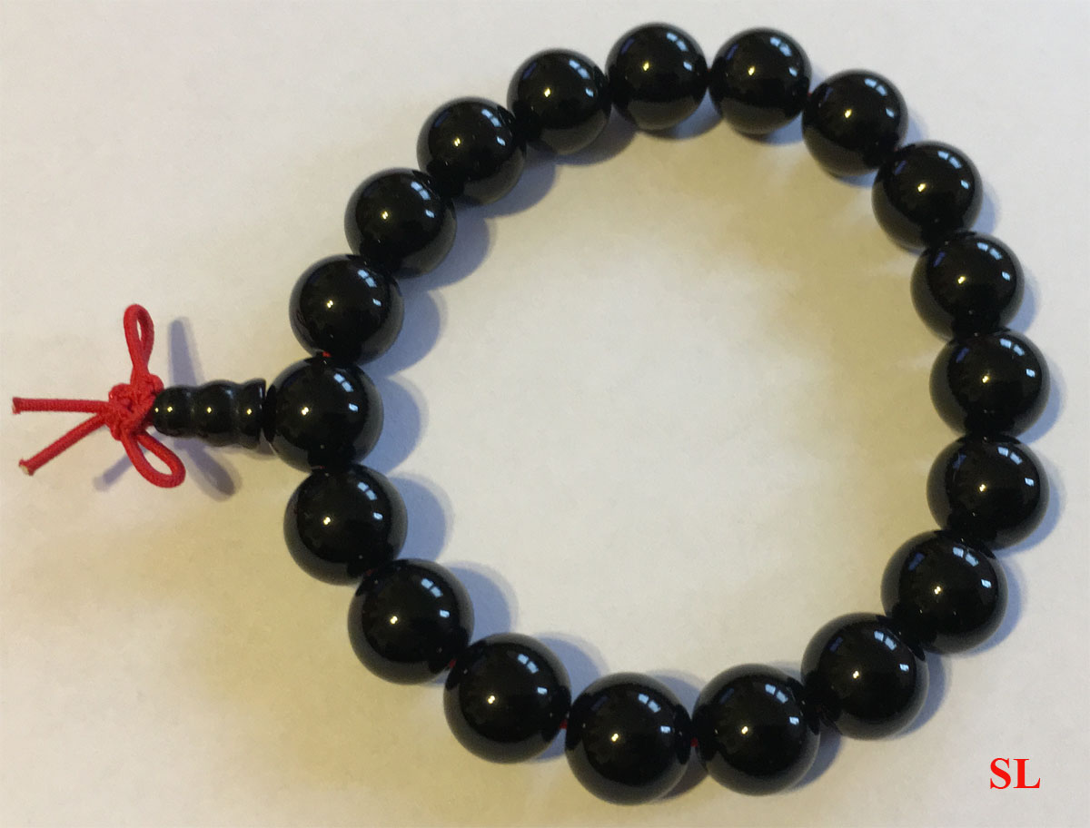 Bracelet-onyx-noir-tibetain-porte-bonheur-10mm